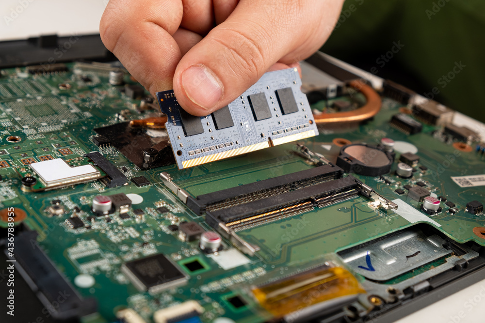 installing RAM in a laptop, laptop repair installing RAM in a laptop, laptop repair