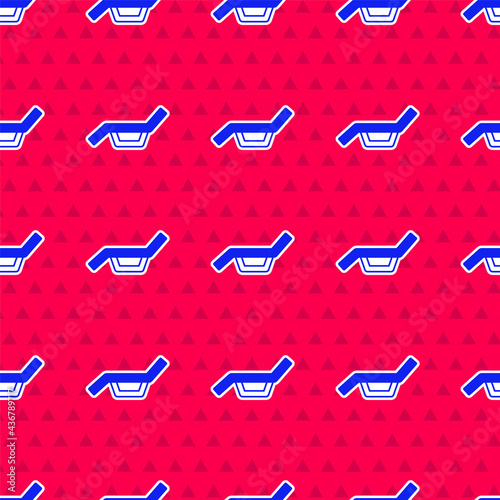 Blue Sunbed icon isolated seamless pattern on red background. Sun lounger. Vector