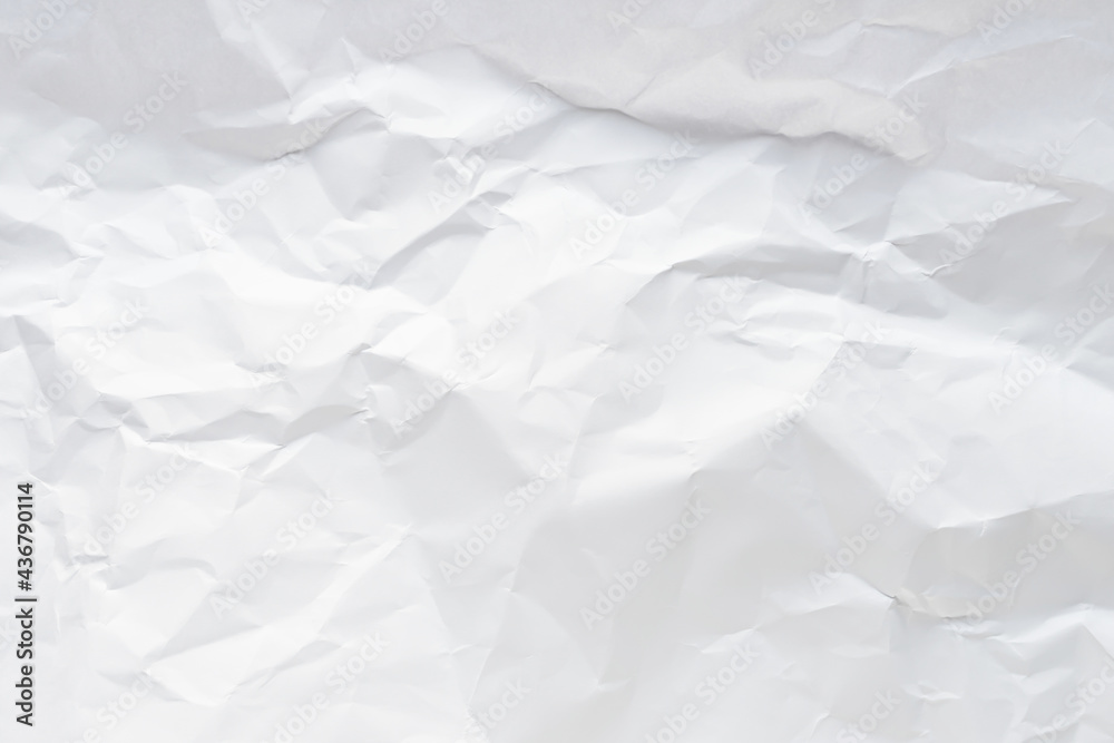 Fototapeta premium White crumpled paper texture background.