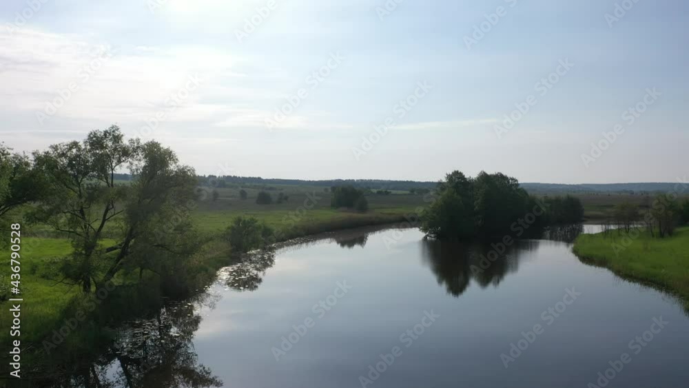 Flying a quadrocopter at low altitude over the river Flying a quadrocopter at low altitude over the river