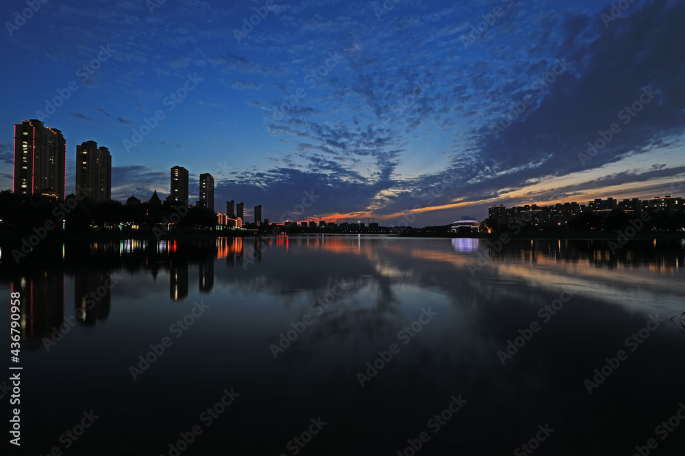 Naklejka premium Evening scenery of waterfront city, North China