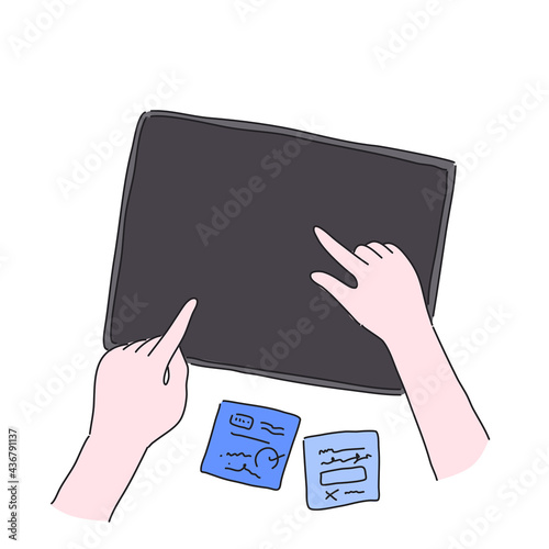 hand touch on iPad with post it nore