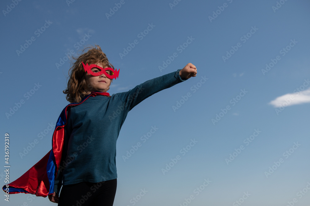 Excited child boy dressed like superhero. Super hero concept. Excited child boy dressed like superhero. Super hero concept.