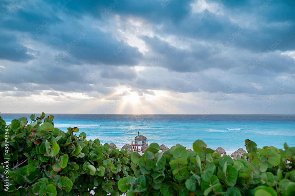 Cancun beach in mexico with umbrellas