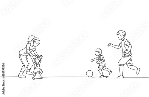 One continuous line drawing of young father playing soccer with son while mother teaching daughter to walk at field. Happy family parenting concept. Dynamic single line draw design vector illustration