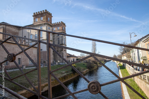 Robecco sul Naviglio ( MI ), Italy - April 01, 2021: Robecco sul Naviglio town and Naviglio Grande Palazzo Archinto wiew, Milano, Lombardy, Italy photo