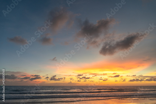 Majestic sunset or sunrise landscape Amazing light of nature cloudscape sky and Clouds moving away rolling .Beautiful Phuket beach is a famous tourist destination in Andaman sea summer. 