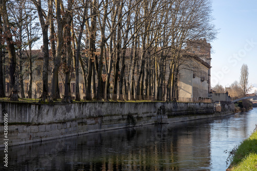 Robecco sul Naviglio ( MI ), Italy - April 01, 2021: Robecco sul Naviglio town and Naviglio Grande, Milano, Lombardy, Italy photo