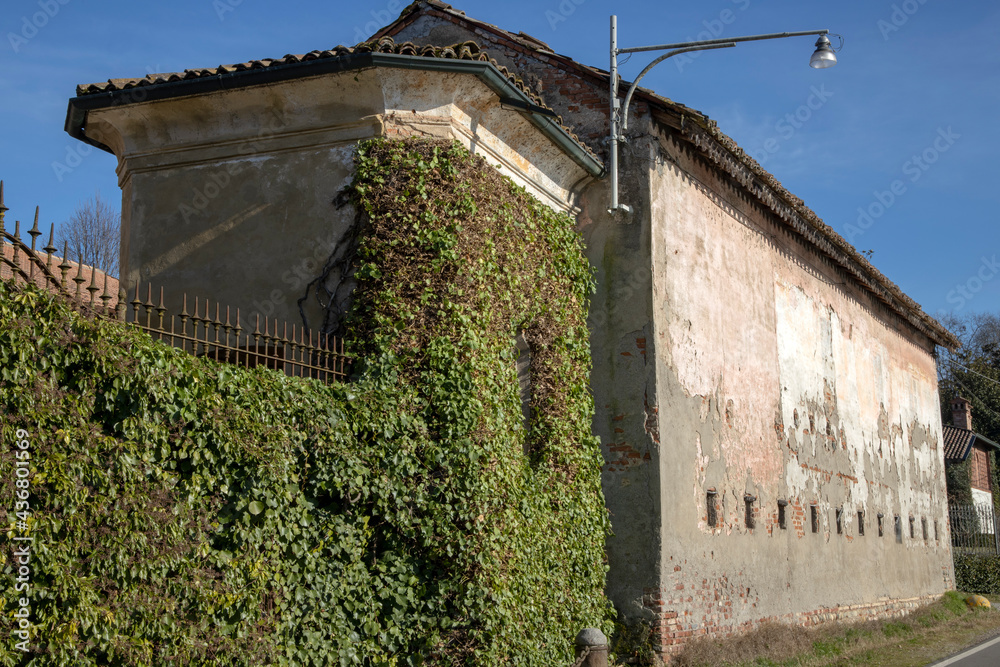 Robecco sul Naviglio ( MI ), Italy - April 01, 2021: Robecco sul Naviglio town and Naviglio Grande, Milano, Lombardy, Italy Robecco sul Naviglio ( MI ), Italy - April 01, 2021: Robecco sul Naviglio town and Naviglio Grande, Milano, Lombardy, Italy