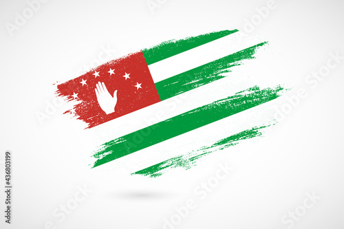 Happy independence day of Abkhazia with vintage style brush flag background
