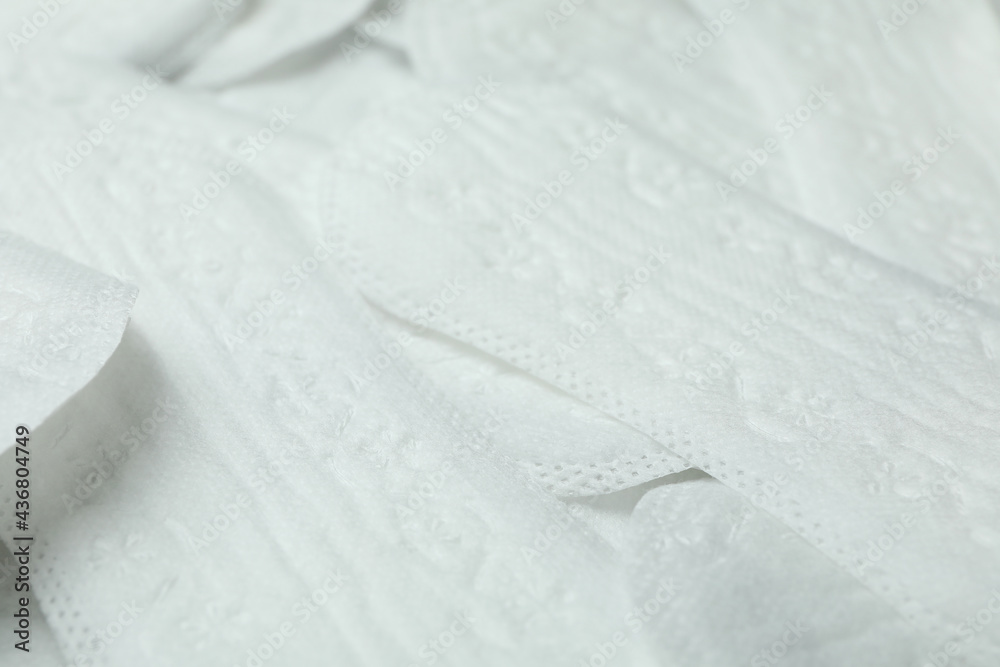 Hygiene pads on whole background, close up Hygiene pads on whole background, close up