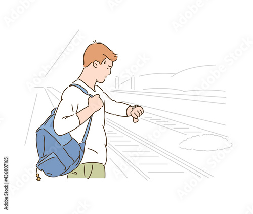 A man is looking at his watch while waiting for the subway. hand drawn style vector design illustrations. 