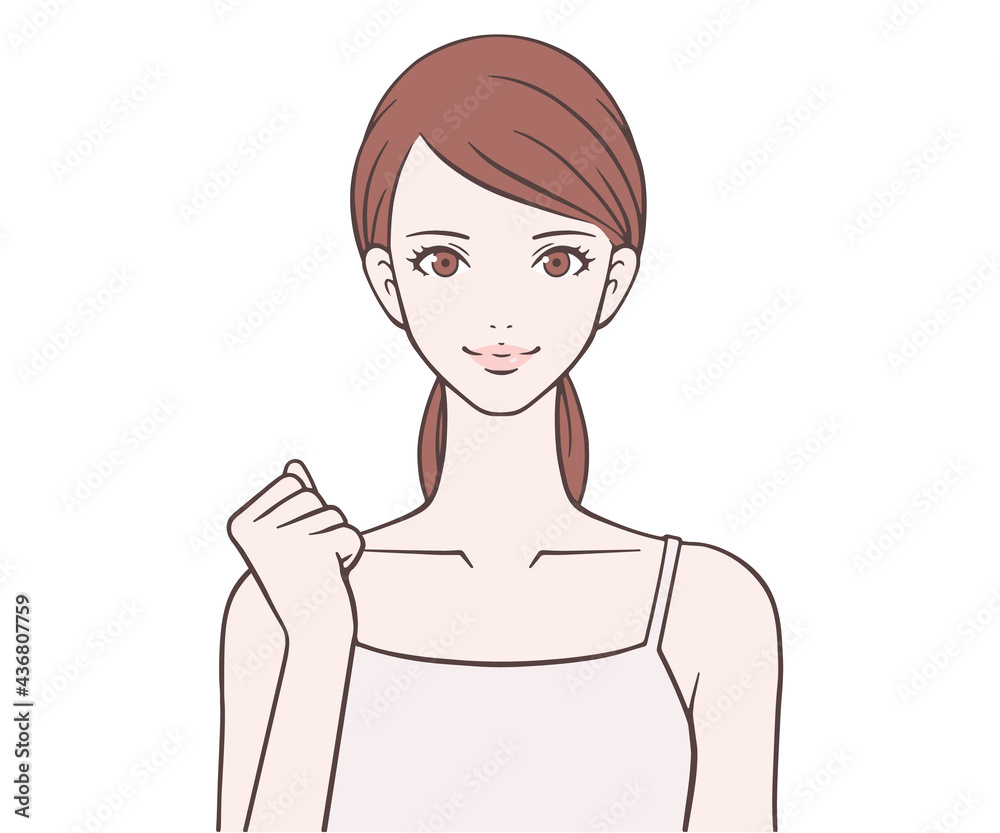 ガッツポーズをする女性