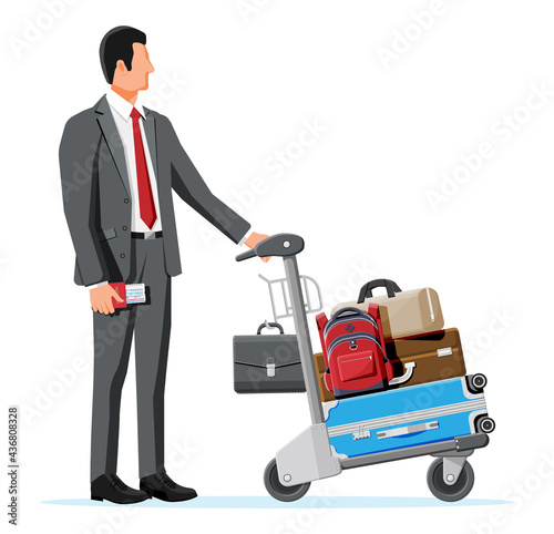Man And Hand Truck Full Of Bags Isolated On White. Metal Airport Luggage Trolley Icon. Hand Cart. Handcart For Baggage Or Shopping. Transportation Equipment. Cartoon Flat Vector Illustration