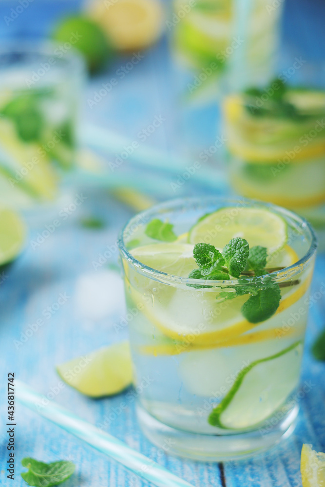 Glasses with lemon and lime lemonade Glasses with lemon and lime lemonade