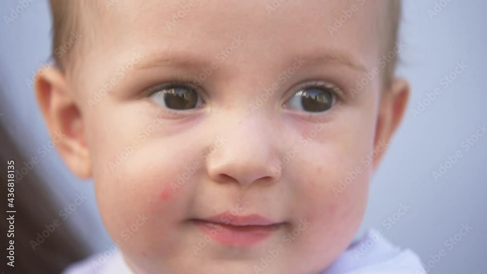 Beautiful happy family. Smiling baby face. Happy family. Happy baby face. Macro close-up of a kid face. Happy family concept Beautiful happy family. Smiling baby face. Happy family. Happy baby face. Macro close-up of a kid face. Happy family concept