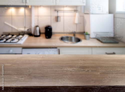 blurred kitchen interior and desk space
