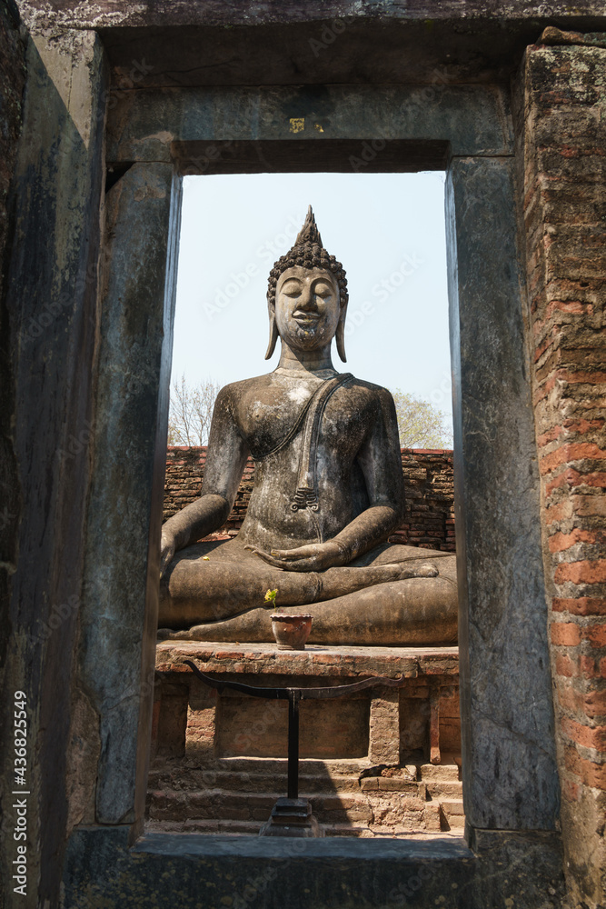 A Buddha statue at Sri Chum Little Temple archaeological site, Sukhothai, Thailand