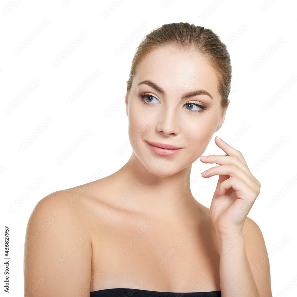 Young attractive woman with perfect make-up posing at studio over white background, beauty female portrait. Young attractive woman with perfect make-up posing at studio over white background, beauty female portrait.
