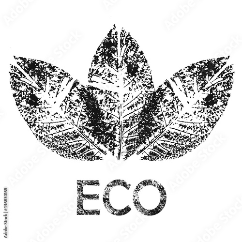 Three leaf decals folded into fan with Eco. Eco with Grunge Effect. photo