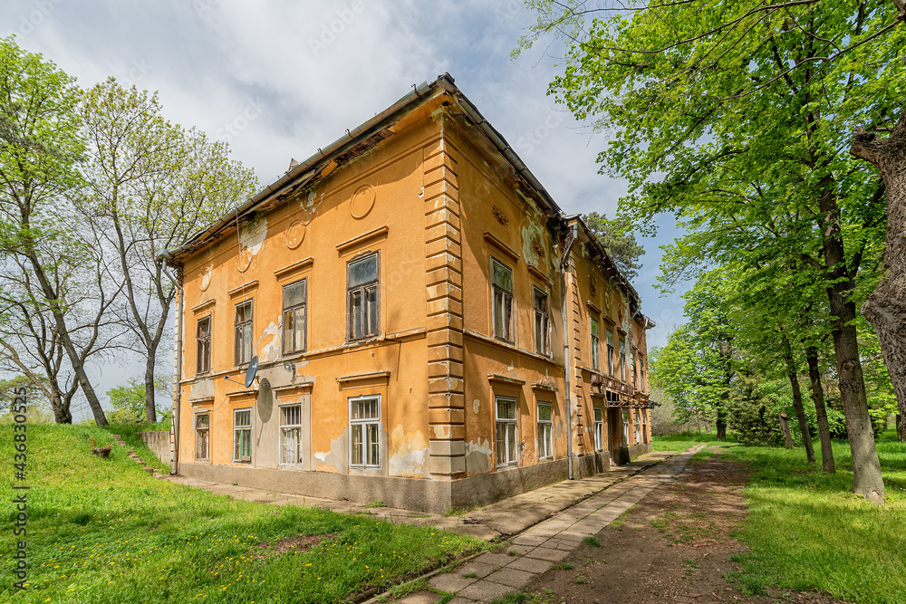 Novi Becej, Serbia - May 01, 2021: Castle on Biserno Ostrvo (Pearl Island) in the natural surroundings og a branch of the river, socalled dead Tisa river.