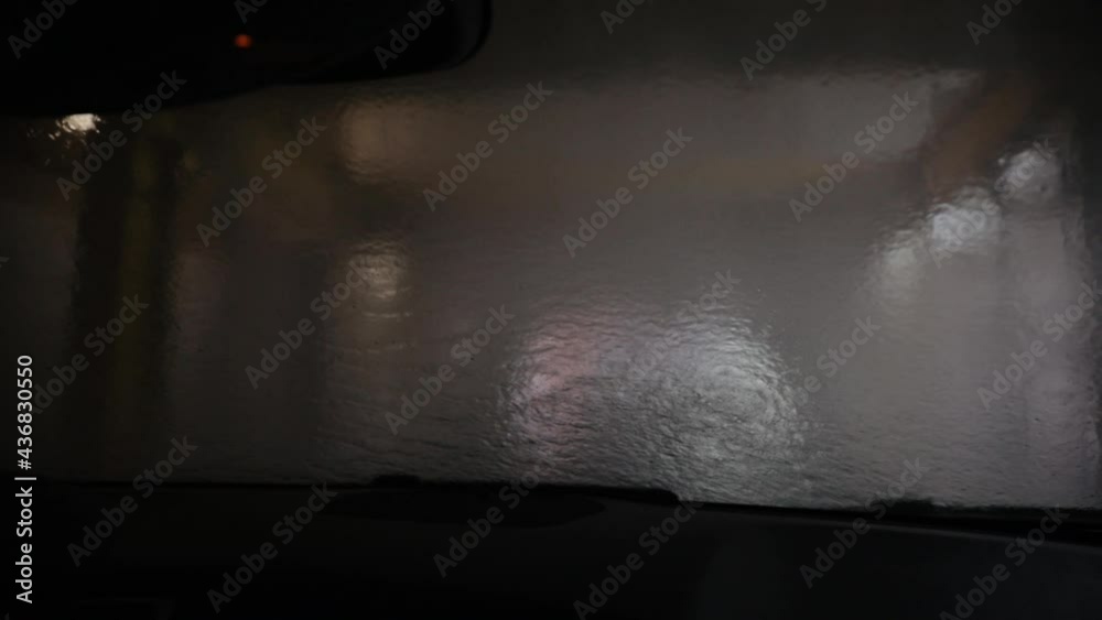 Automatic car wash, view from inside the car interior Automatic car wash, view from inside the car interior
