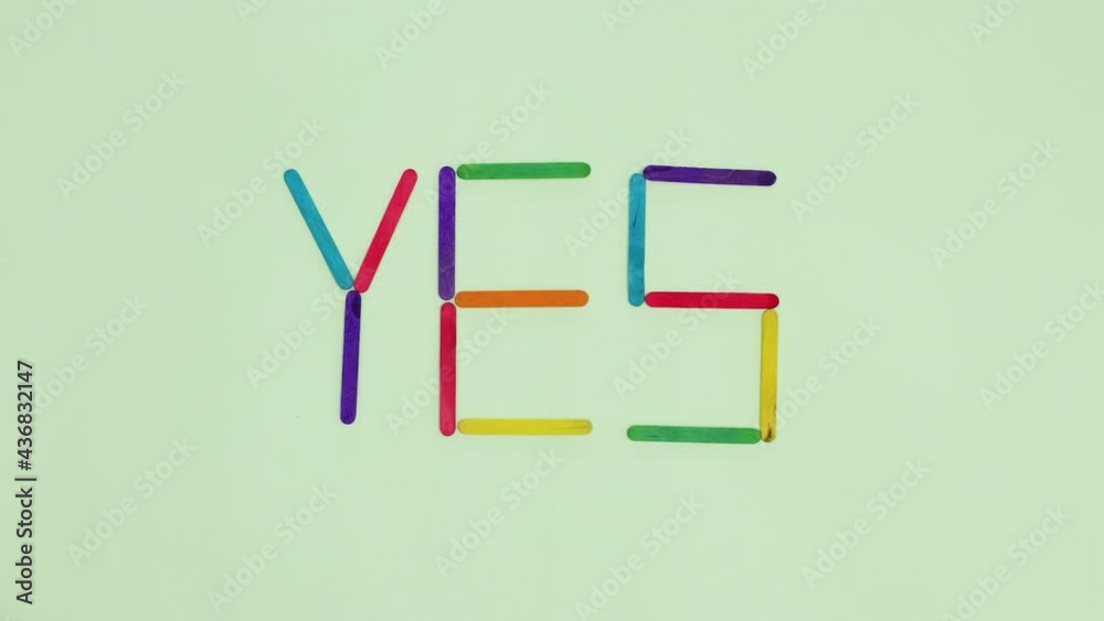 Wooden sticks make YES word. Stop motion Wooden sticks make YES word. Stop motion