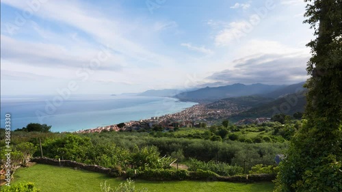 Borgio Verezzi, Italy. May 22th, 2021. Time lapse of a view from Verezzi on the Ligurian Riviera of Borgio Verezzi, Pietra Ligure, Loano, Ceriale and Albenga in the background. photo