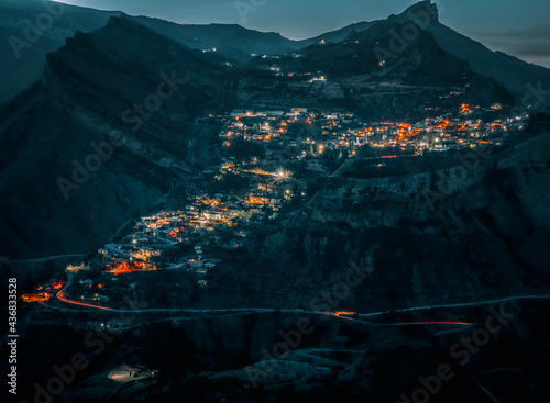 Night view of a mountain village. Authentic Dagestani mountain village of Gunib. Russia. photo