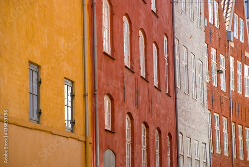 Photography View along multi colored facades of houses in Copenhag