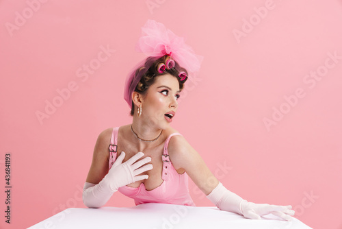 Fototapeta Young smiling white woman barbie in pink dress
