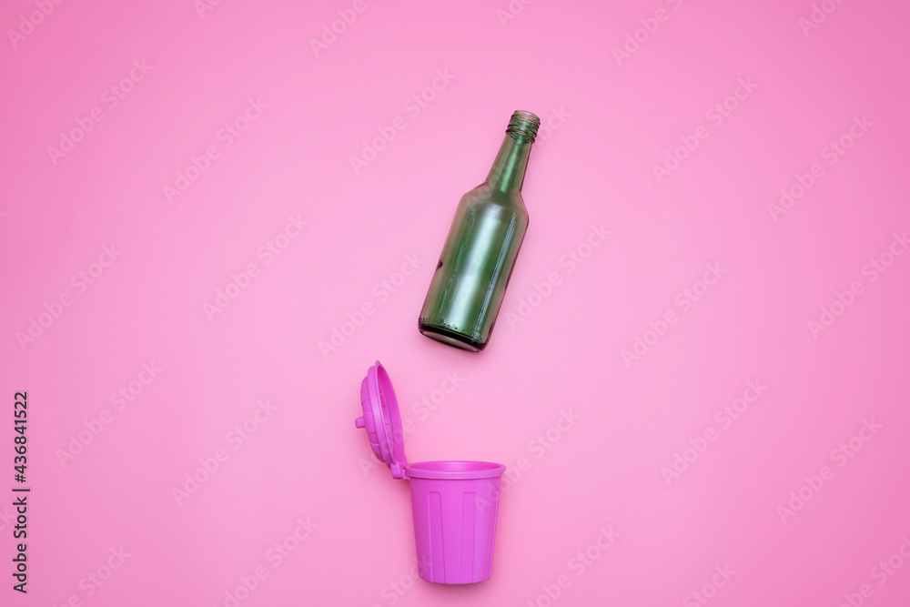 top view of trash bins and assorted garbage isolated on pink, recycle concept top view of trash bins and assorted garbage isolated on pink, recycle concept