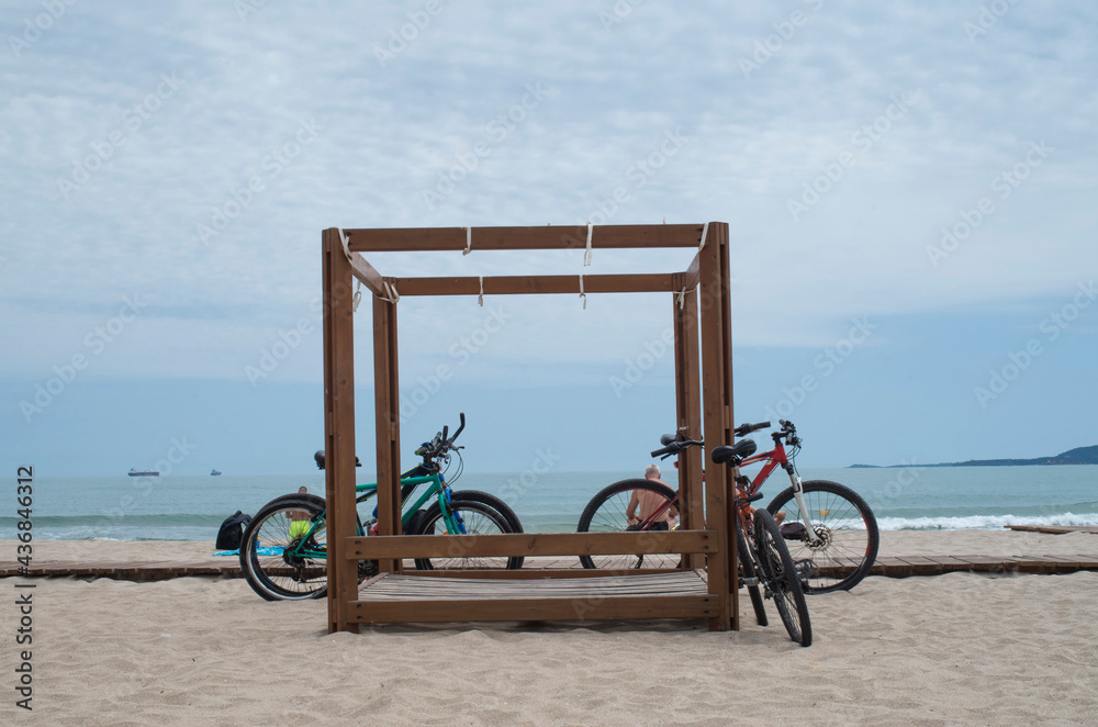 Bicycles parked on the beach in spring, Bulgaria Bicycles parked on the beach in spring, Bulgaria