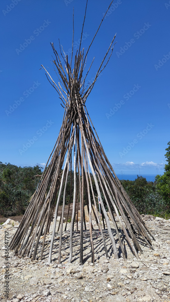 The Patio das Cabanas (Huts Courtyard) in Vila Cha, Esposende, Portugal. Wooden stick hut house, looking like Indian tepee with a beautiful panorama view towards the Portuguese coastline. The Patio das Cabanas (Huts Courtyard) in Vila Cha, Esposende, Portugal. Wooden stick hut house, looking like Indian tepee with a beautiful panorama view towards the Portuguese coastline.