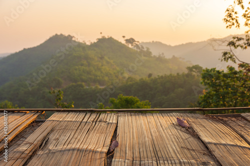Bamboo Wooden background and landscape nature mountain on sunshine.