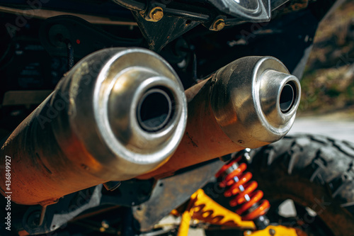 Exhaust pipe of ATV car close up