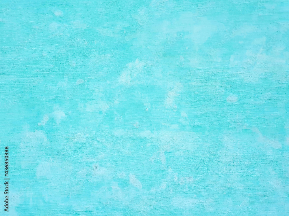 Turquoise painted wall background, texture. Concrete structure closeup