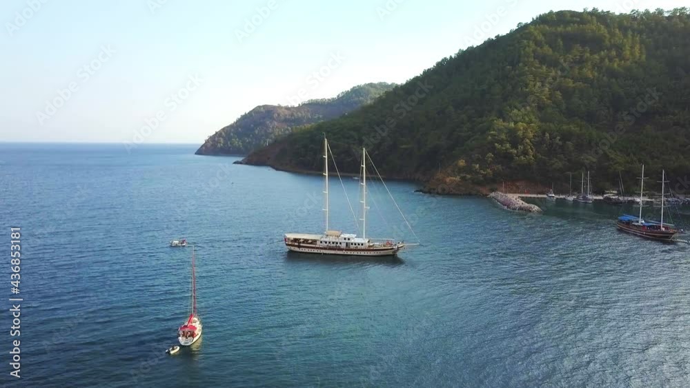 Aerial Ekincik Bay Landscape; One of the most well known departure and arrival points for Blue Cruise Tours. A fantastic experience between swimming and eating. High angle view
Aerial Ekincik Bay Landscape; One of the most well known departure and arrival points for Blue Cruise Tours. A fantastic experience between swimming and eating. High angle view