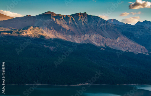 dramatic summer landscape photo of Two Medicine Lake with the Sinopah Mt on the background in Glacier National Park in Montana. photo