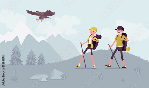 Active seniors, happy healthy elderly people nordic walking, mountains. Couple of older adults, athletes, tourist travelling enjoying outdoor hiking with poles. Beautiful summer, spring nature scenery