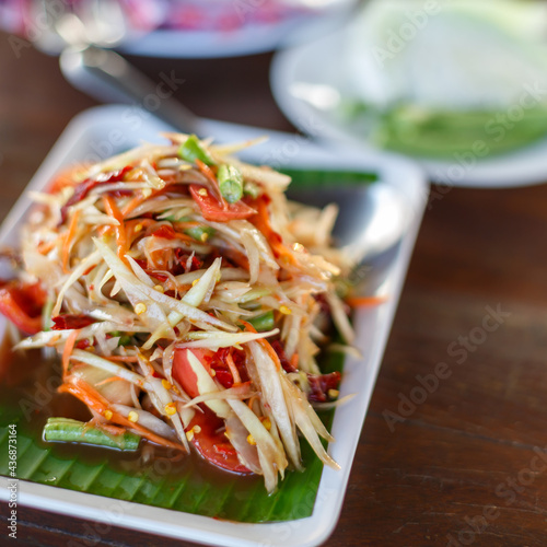 Green papaya salad thai food style . photo