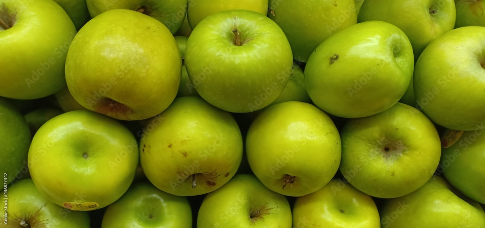 fresh green apples in supermarket fresh green apples in supermarket