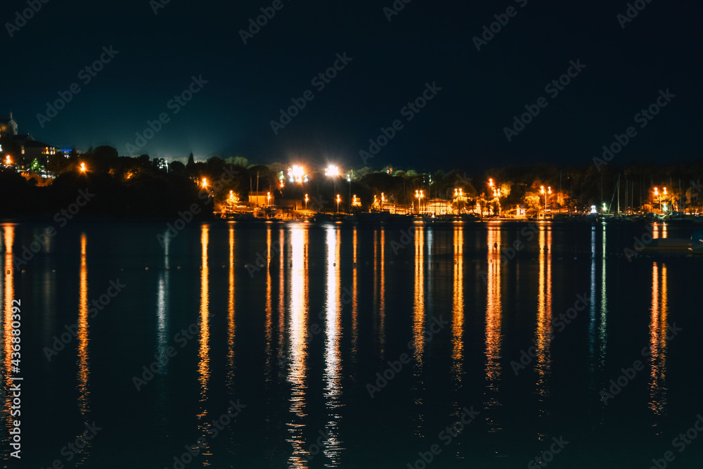 night view of the city over the sea
