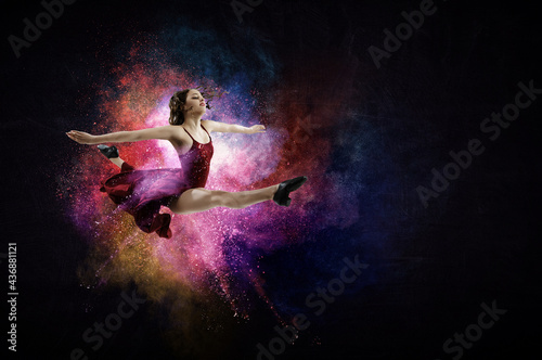 Female dancer against abstr...