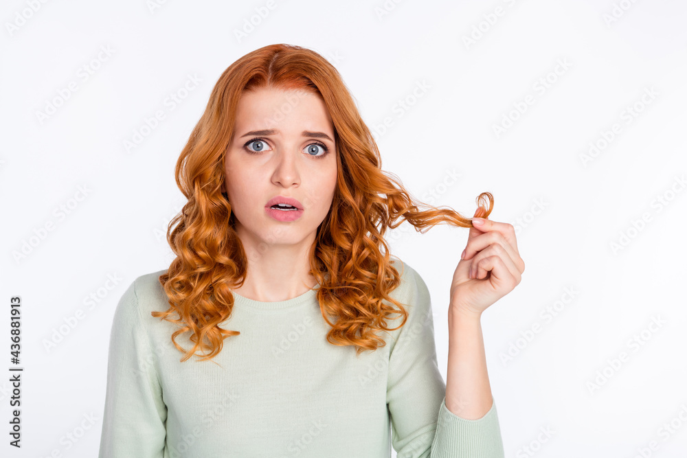 Photo portrait of red haired girl in casual outfit upset with dry hair need haircut isolated white color background Photo portrait of red haired girl in casual outfit upset with dry hair need haircut isolated white color background