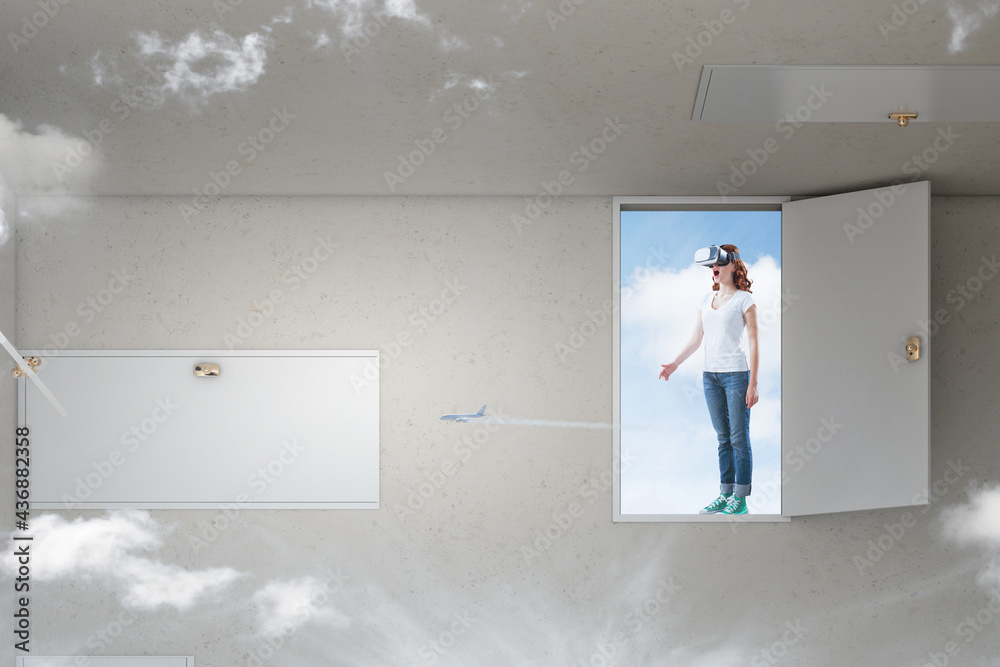 Fototapeta premium Woman wearing virtual reality goggles