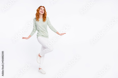 Full length body size photo young woman red hair looking copyspace dancing at party isolated white color background