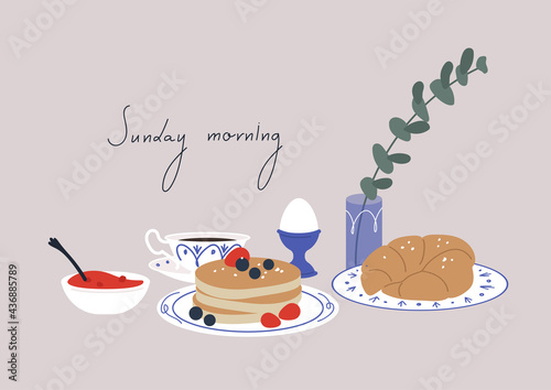 Breakfast still life, a table served with vintage cups and plates, sweet pastry and coffee