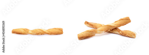 Spiral bread sticks with cheese on a white background