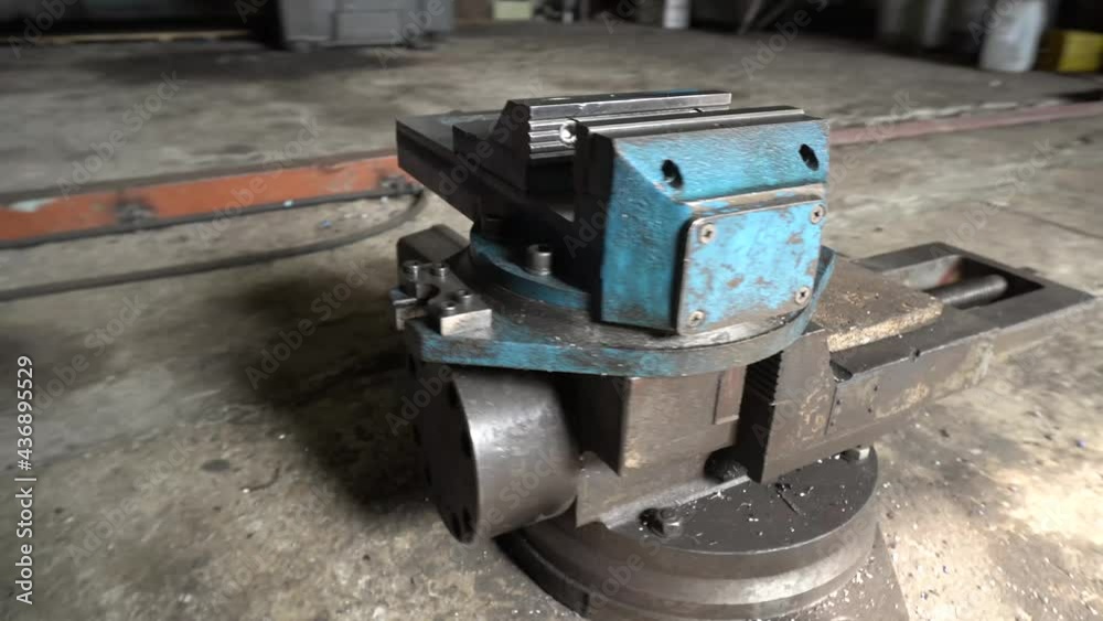old vise tool for clamping metal parts and processing old vise tool for clamping metal parts and processing